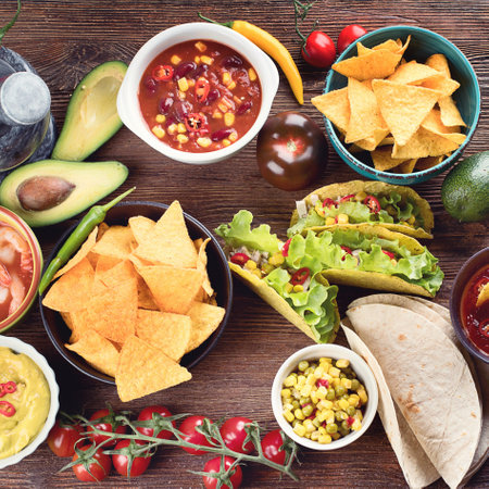 Mexican traditional food dishes on a wooden background. Top view.の写真素材
