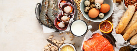 Allergy food concept. Assorted allergic products on light background, copy space, panorama, bannerの写真素材