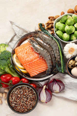 Ketogenic diet concept, ingredients for healthy food. Various balanced useful components healthy low carbohydrate foods on a light background. Top view.の写真素材