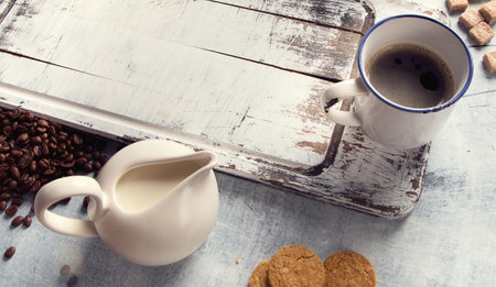 Cup of coffee on a gray background. Coffee time concept. Top view.の写真素材