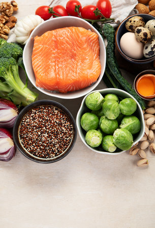 Various brain food products: fish, meat, nuts, vegetables and greens. Healthy food on a light background. Top view. Copy space.の写真素材