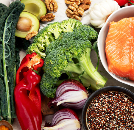 Various brain food products: fish, meat, nuts, vegetables and greens. Healthy food on a light background. Top view.の写真素材