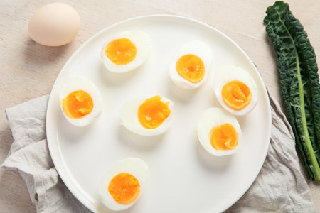 Healthy Cooked Hard Boiled Eggs on a white background. Top view.の写真素材