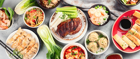 Assorted Chinese dishes on gray background. Asian food concept. Top view. Panorama, bannerの写真素材