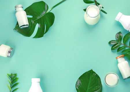 Various vegan plant based milk and ingredients. Dairy free milk substitute drink. Healthy vegan and vegetarian diet concept. Top view with copy spaceの写真素材