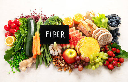 High fiber foods for healthy bowel on a white background. Healthy balanced dieting concept. Top view.の写真素材