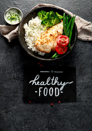 Healthy Homemade Chicken Breast and Rice with Broccoli on a light background. Top view.の写真素材