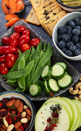 Healthy balanced dieting concept. Selection of rich fiber sources vegan food. Vegetables, fruits,...