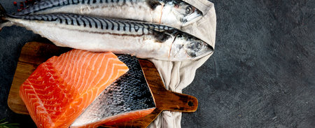 Variety of fresh seafood and herbs. Fresh fish and seafood arrangement. Top view.の写真素材