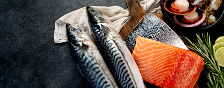 Variety of fresh seafood and herbs. Fresh fish and seafood arrangement. Top view.の写真素材