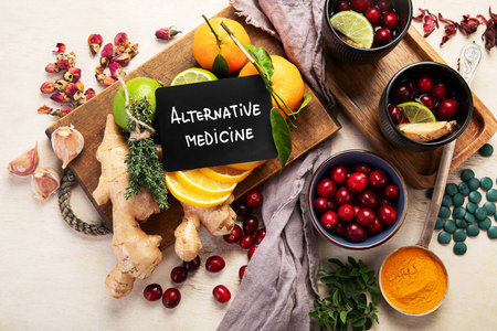 Healthy food immune boosting selection. Cold and flu remedy relief. High in antioxidants, minerals and vitamins on a light background. Top view.の写真素材