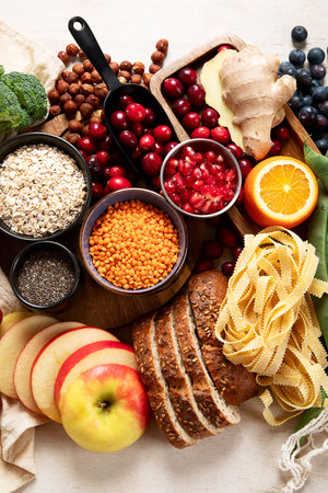 High fiber food for healthy bowel on a white background. Healthy balanced dieting concept. Top view.の写真素材