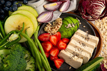 Variety of vegan, organic plant based protein food on a light background. Top view.