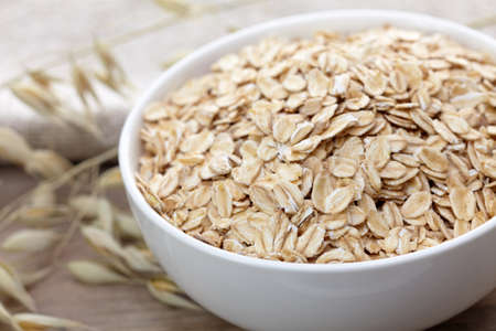 Bowl of oat flakesの写真素材