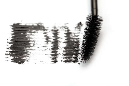 Stroke of black mascara on white backgroundの写真素材