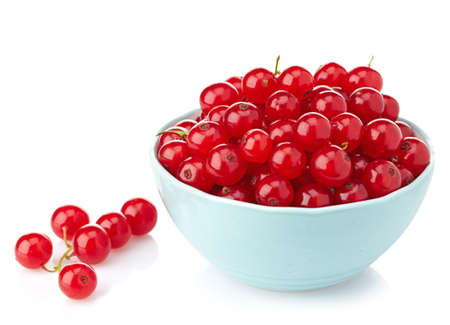 Bowl of fresh red currants on white backgroundの写真素材