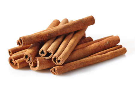 Cinnamon sticks on white backgroundの写真素材