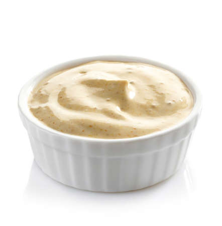 Bowl of curry sauce on white backgroundの写真素材