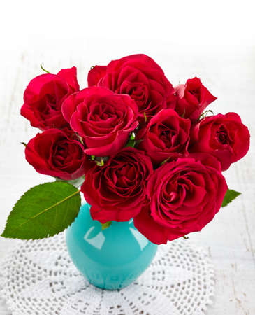 Red roses in a vaseの写真素材