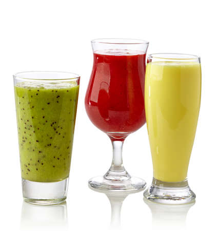 Strawberry, kiwi and banana smoothies isolated on white backgroundの写真素材