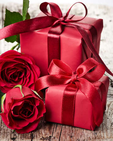 Red roses and gift boxesの写真素材