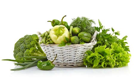 Composition of fresh green vegetables isolated on white backgroundの写真素材