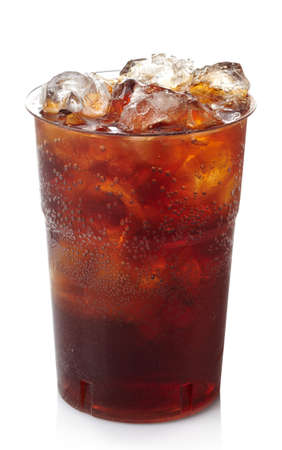 Plastic glass of cola with ice isolated on white backgroundの写真素材