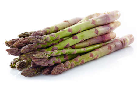 Fresh green asparagus isolated on white backgroundの写真素材
