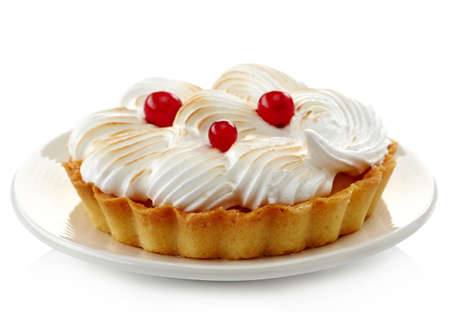 Plate of lemon tart and fresh cranberries isolated on white backgroundの写真素材
