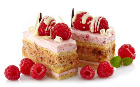 Two raspberry cakes isolated on white backgroundの写真素材
