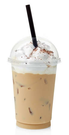 Iced coffee covered with whipped cream in plastic glass isolated on white backgroundの写真素材