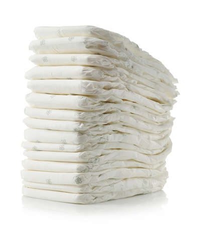 Stack of diapers isolated on white backgroundの写真素材