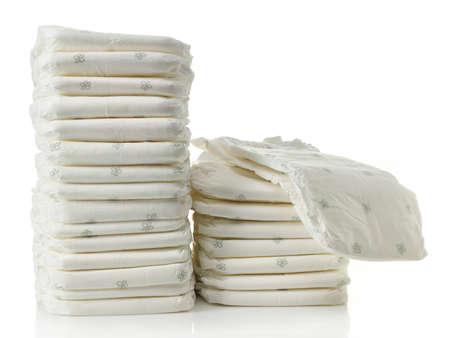 Two stacks of diapers isolated on white backgroundの写真素材