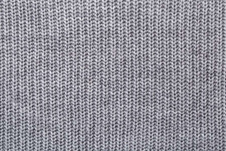 Grey knitted fabric background textureの写真素材
