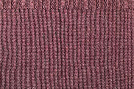 Brown knitted fabric background textureの写真素材