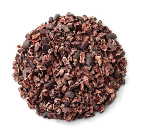 Circle of cacao nibs isolated on white backgroundの写真素材