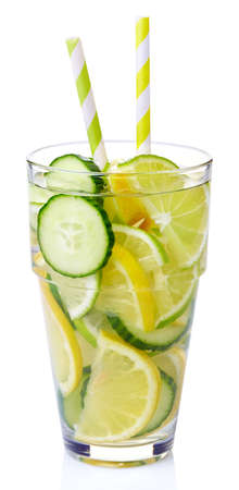 Glass of cucumber, lemon, lime detox water isolated on white backgroundの写真素材