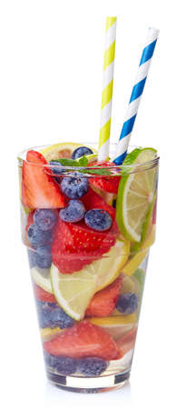 Glass of lime, strawberry, blueberry, lemon detox water isolated on white backgroundの写真素材