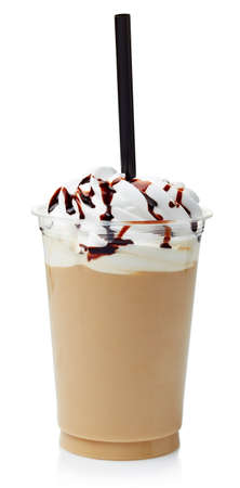 Coffee frappe covered with whipped cream in plastic glass isolated on white backgroundの写真素材