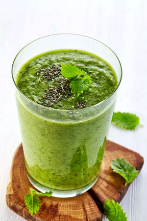 Glass of healthy green vegetable and fruit smoothieの写真素材