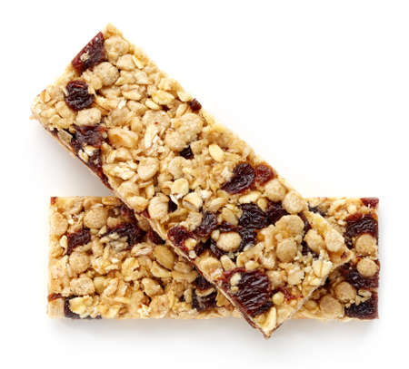 Granola bar with raisins isolated on white backgroundの写真素材