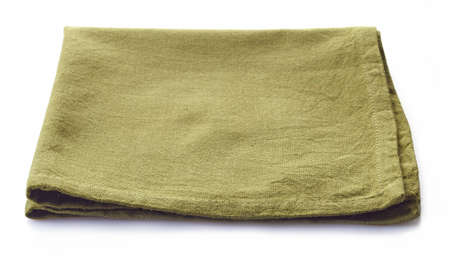 Green cotton napkin isolated on white backgroundの写真素材