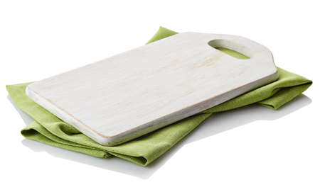 White wooden cutting board on cotton napkin isolated on white background. Clipping pathの写真素材