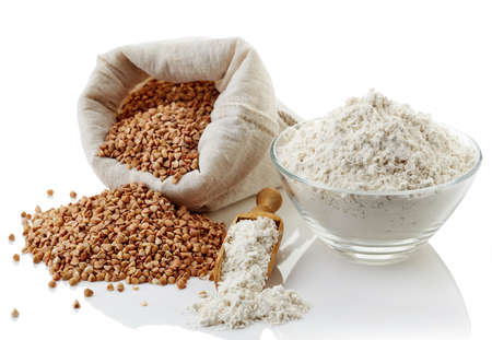Buckwheat flour and buckwheat isolated on white backgroundの写真素材