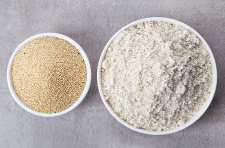 Bowl of amaranth seeds flour and bowl of amaranth seeds from top viewの写真素材