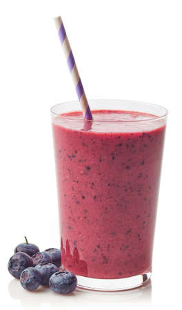 Glass of fresh healthy blueberry smoothie isolated on white backgroundの写真素材