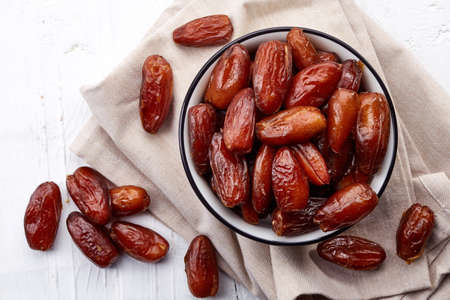 Bowl of dried dates from top viewの写真素材