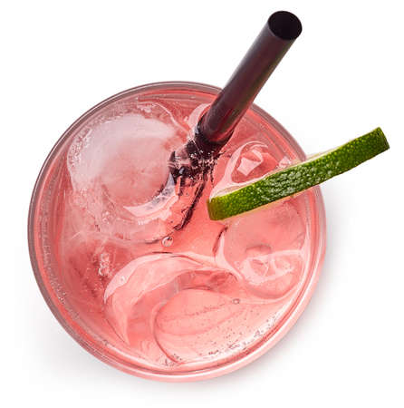 Glass of pink soda drink with ice isolated on white background. From top viewの写真素材