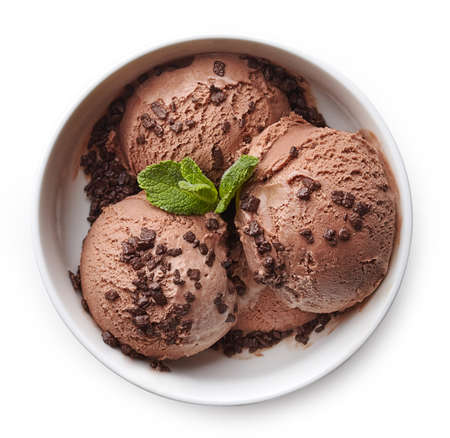 Bowl of chocolate ice cream isolated on white background. From top viewの写真素材