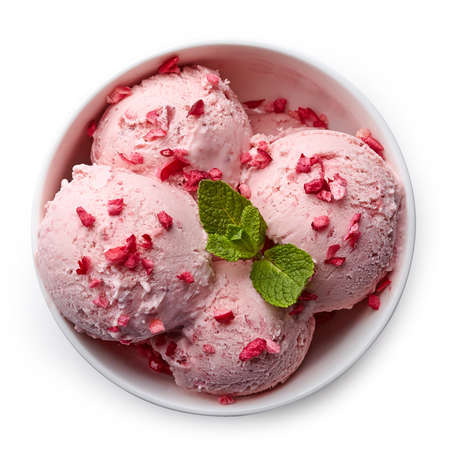 Bowl of pink strawberry ice cream isolated on white background. From top viewの写真素材